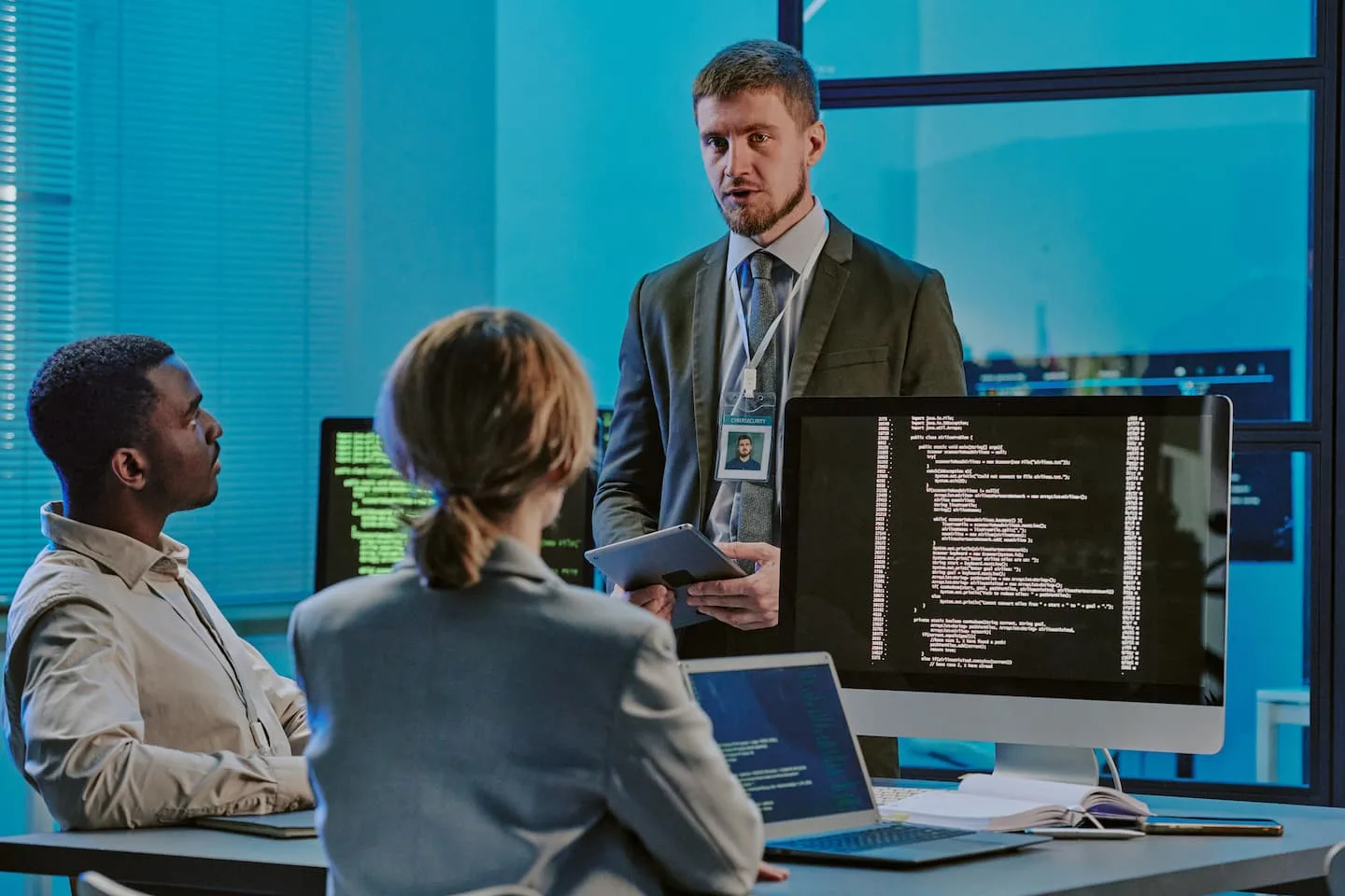 Engineers in a data centre security meeting